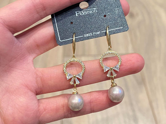 Bow earrings with pearls
