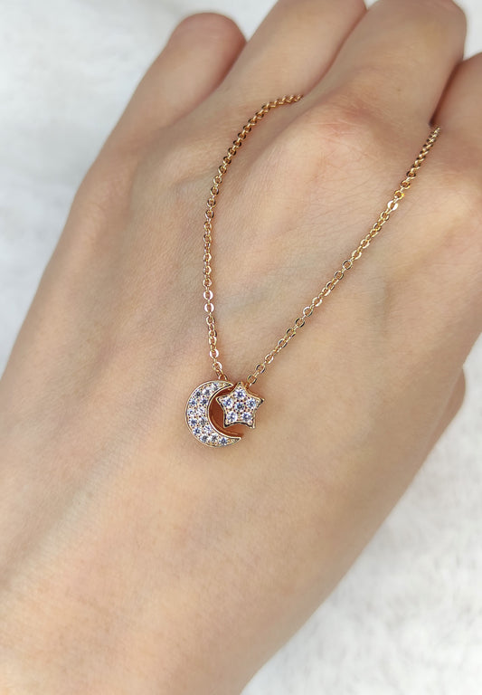 2-i-1 stjerne- og månehalskjede i gullfarge