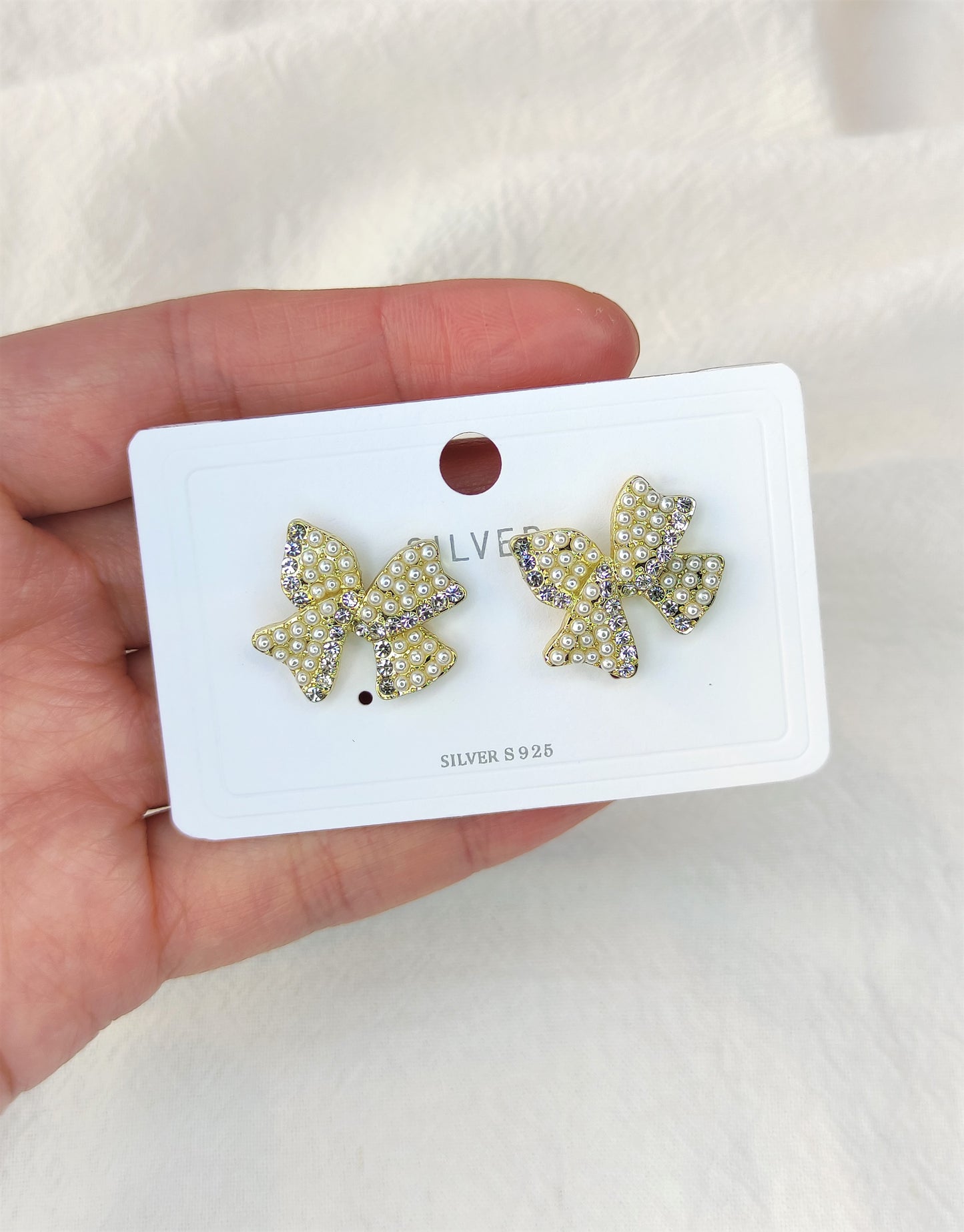 Øredobber med sløyfer og perler