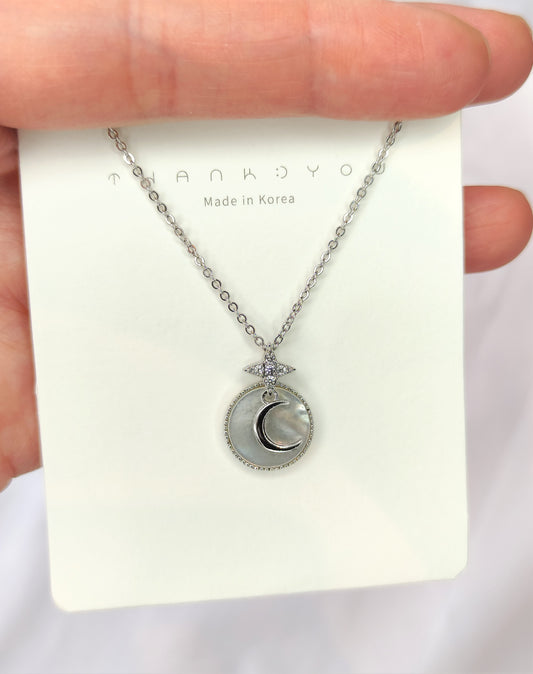 Halskjede med måne og stjerne
