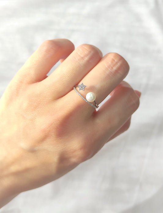 Ring med stjerne og perle