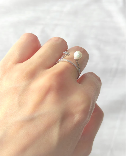 Ring med stjerne og perle
