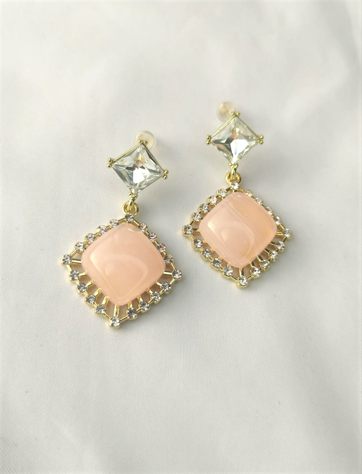 Rosa øredobber med zirkonia