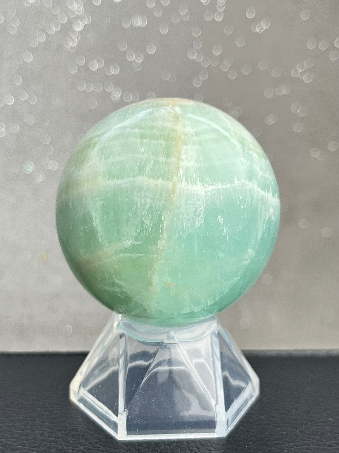 Green calcite sphere (pistachio calcite)