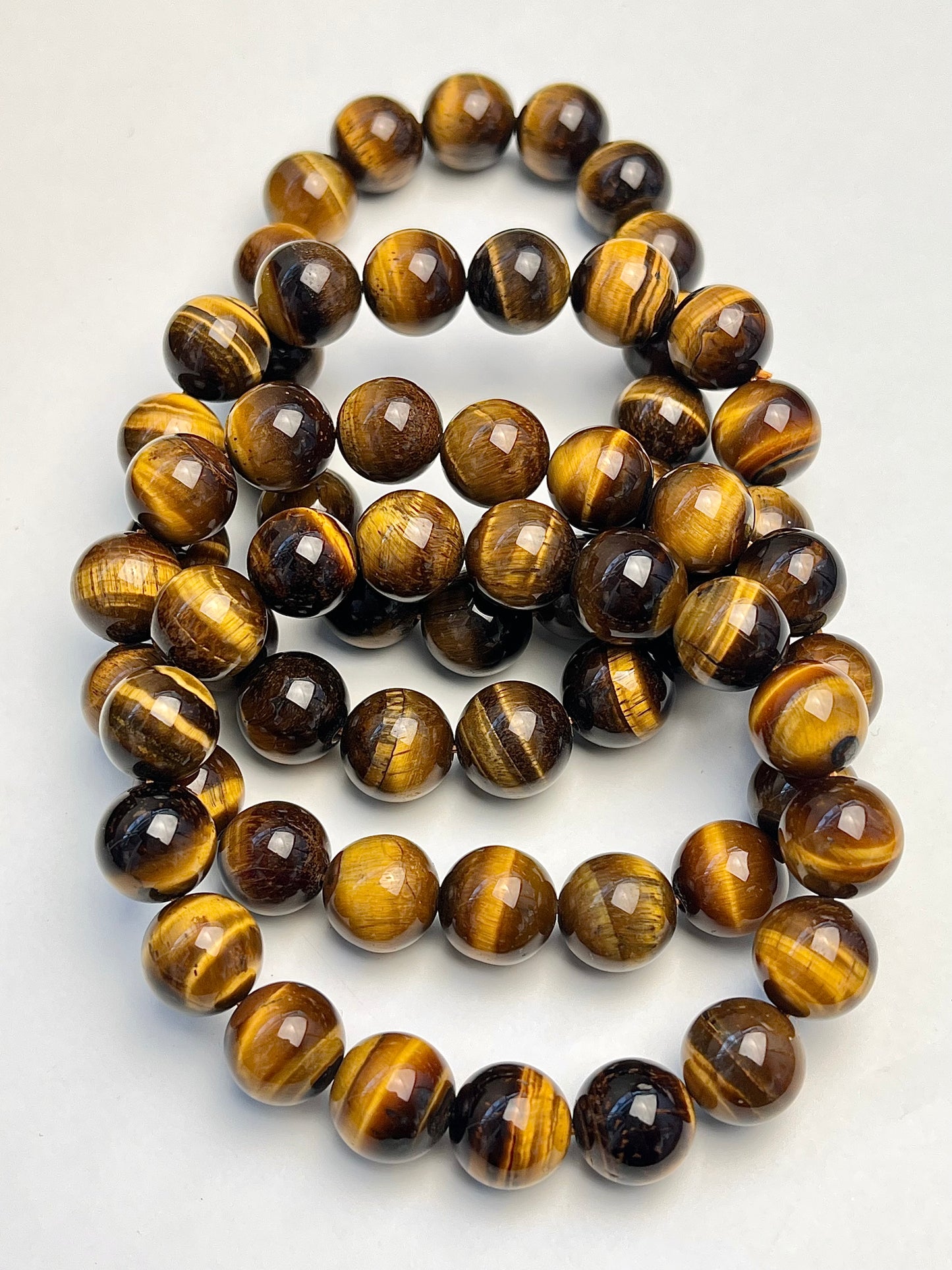 Tigerøye armbånd 11-12mm+