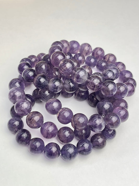 Lilla Fluoritt armbånd 11-12mm+