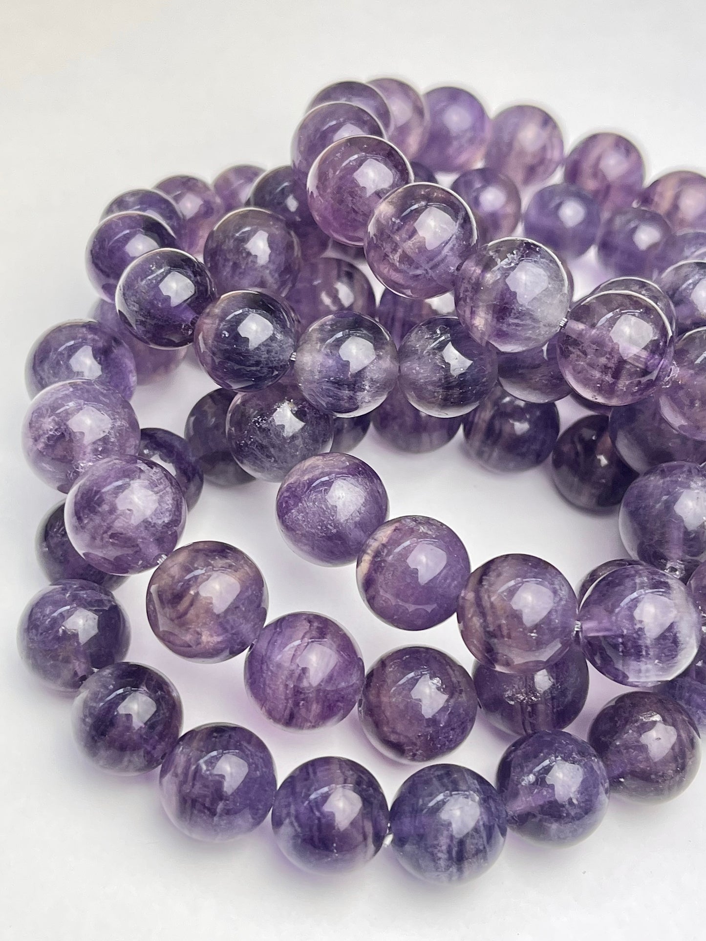 Lilla Fluoritt armbånd 11-12mm+